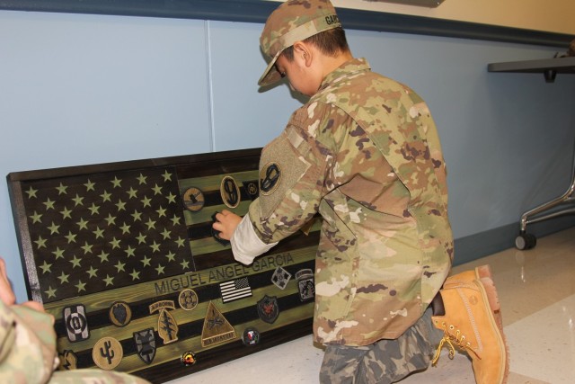Eight-year-old Miguel Garcia and others participate in a Make a Wish Foundation event Nov. 7, 2020, at Fort McCoy, Wis. On Nov. 7, Fort McCoy hosted a Make a Wish Foundation event for Garcia, whose wish was to be an Army Soldier. Garcia was able...