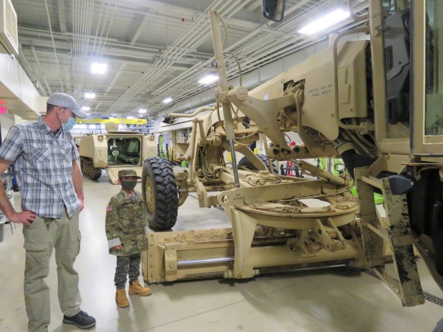 Eight-year-old Miguel Garcia and others participate in a Make a Wish Foundation event Nov. 7, 2020, at Fort McCoy, Wis. On Nov. 7, Fort McCoy hosted a Make a Wish Foundation event for Garcia, whose wish was to be an Army Soldier. Garcia was able...