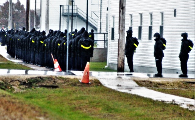 U.S. Navy recruits walk to their barracks Oct. 22, 2020, at Fort McCoy, Wis. The Navy’s Recruit Training Command (RTC) of Great Lakes, Ill., worked with the Army at Fort McCoy so the post could serve as a restriction-of-movement (ROM) site for...