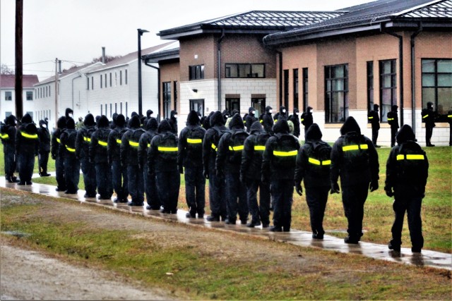 U.S. Navy recruits walk to their barracks Oct. 22, 2020, at Fort McCoy, Wis. The Navy’s Recruit Training Command (RTC) of Great Lakes, Ill., worked with the Army at Fort McCoy so the post could serve as a restriction-of-movement (ROM) site for...
