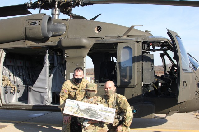 Eight-year-old Miguel Garcia and others participate in a Make a Wish Foundation event Nov. 7, 2020, at Fort McCoy, Wis. On Nov. 7, Fort McCoy hosted a Make a Wish Foundation event for Garcia, whose wish was to be an Army Soldier. Garcia was able...