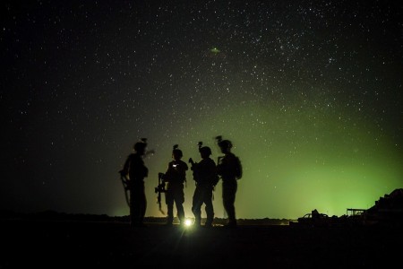 U.S. Army Soldiers standby for their night guard shift in Kenya, Jan. 20, 2020. 