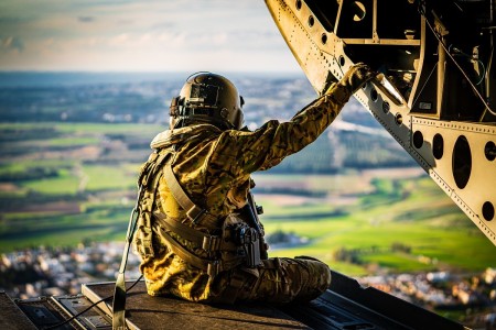 Staff Sgt. Daniel Pennington, a flight engineer assigned to B Co &#34;Big Windy,&#34; 1-214th General Support Aviation Battalion, takes in his &#39;office&#39; view from the ramp of his CH-47 Chinook while flying over the island of Cyprus on Jan. 14, 2020. 