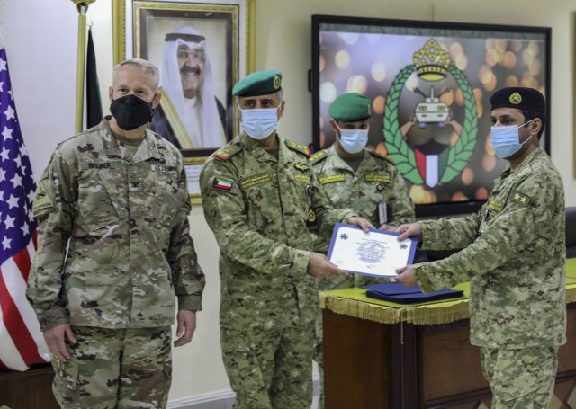 In a socially distanced ceremony full of senior military leaders from the Kuwait National Guard and 2nd Armored Brigade Combat Team, 1st Armored Division, Soldiers of the KNG were awarded course completion certificates near Kuwait City, Kuwait on...