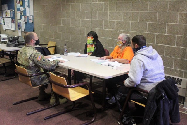 Civil affairs Soldiers participate in a simulated key leader engagement Oct. 30, 2020, in a classroom in building 50 as part of a 38A Civil Affairs Military Occupational Specialty-Transition Course at Fort McCoy, Wis. The course is coordinated by...