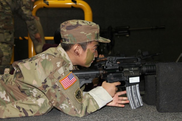 Eight-year-old Miguel Garcia and others participate in a Make a Wish Foundation event Nov. 7, 2020, at Fort McCoy, Wis. On Nov. 7, Fort McCoy hosted a Make a Wish Foundation event for Garcia, whose wish was to be an Army Soldier. Garcia was able...