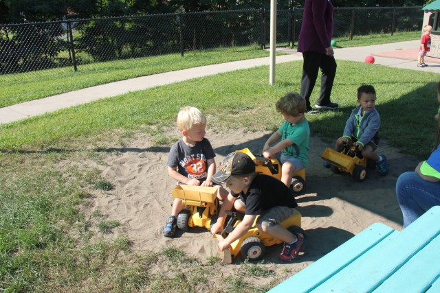 Child Development Center students play on riding toys Aug. 8, 2017, at Fort McCoy, Wis. The Fort McCoy CDC was recently reaccredited through the National Association for the Education of Young Children, earning between 96 and 100 percent in 10...