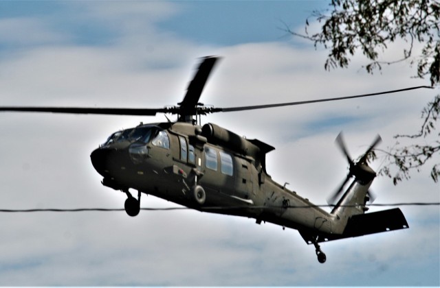 An aircrew with the Wisconsin National Guard’s 1st Battalion, 147th Aviation Regiment operate a UH-60 Black Hawk helicopter Oct. 9, 2020, at Fort McCoy, Wis. Members of the unit regularly complete training operations at Fort McCoy and the unit...