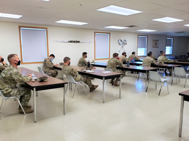 Students participate in a class as part of the Fort McCoy Cold-Weather Operations Course on Dec. 4, 2020, at Fort McCoy, Wis. This was the first day for class 21-01 to be in session. The course is coordinated by the Fort McCoy Directorate of...