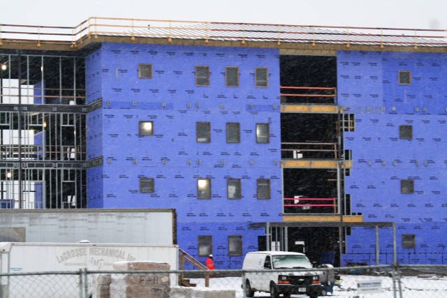 An area of the 1600 block of the cantonment area of the installation is shown Nov. 24, 2020, during a light snowfall as a new multi-million dollar barracks is being built at Fort McCoy, Wis. Contractor L.S. Black Constructors was awarded a $20.6...