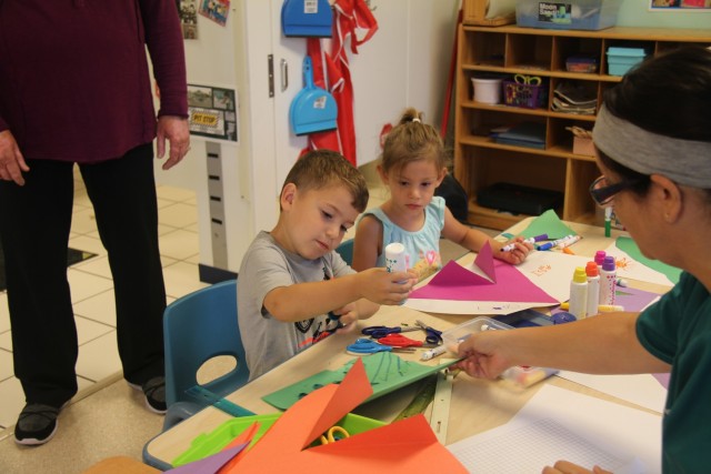Children attending the Fort McCoy Child Development Center work on an art project Aug. 8, 2017, at Fort McCoy, Wis. The Fort McCoy CDC was recently reaccredited through the National Association for the Education of Young Children, earning between...