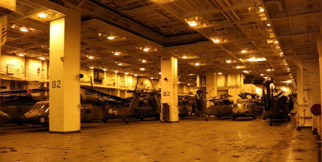 Black Hawk helicopters await offload on Dec. 3 during port operations on board the UNSN Britten in support of 25th CAB’s return from JRTC at Fort Polk, Louisiana.