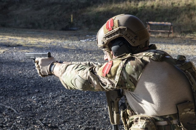 JOINT BASE LEWIS-MCCHORD, Wash. – A Green Beret with 1st Special Forces Group (Airborne) fires his weapon during the stress shoot phase of the Menton Week team competition at Joint Base Lewis-McChord, Wash., Dec. 9, 2020. Menton Week is an...