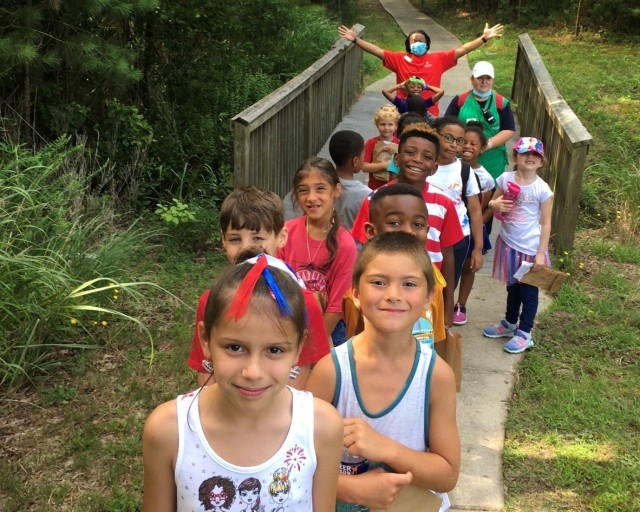 Children with Fort Bragg's Child and Youth Services hike as part of CYS' quality educational programs.