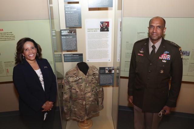 FORT BENNING, Ga. – Lt. Gen. Gary M. Brito and his wife Michelle pose at a "Diversity in Leadership" display moments after it was formally unveiled Dec. 11 at the National Infantry Museum, just outside Fort Benning in Columbus, Georgia. The display highlights three African American Soldiers whose service marked historic milestones in the Army's progress toward diversity. The three are: Brito, currently the Army's Deputy Chief of Staff G-1, but who in his previous assignment was the first African American commanding general of Fort Benning and its U.S. Army Maneuver Center of Excellence. Brito was the event's guest of honor and keynote speaker; Master Sgt. Walter Morris, who served during World War II as first sergeant with the Army's first All-African American Airborne unit, the 555th Parachute Infantry Company; and Master Sgt. Milton "Davey" Lockett, the first African American in Army history to serve as an instructor at Fort Benning's elite U.S. Army Ranger School. Besides information panels and photographs, the display includes one of Brito's uniform jackets, bearing the two stars he wore as Fort Benning's commanding general.
(U.S. Army photo by Markeith Horace, Maneuver Center of Excellence and Fort Benning Public Affairs)