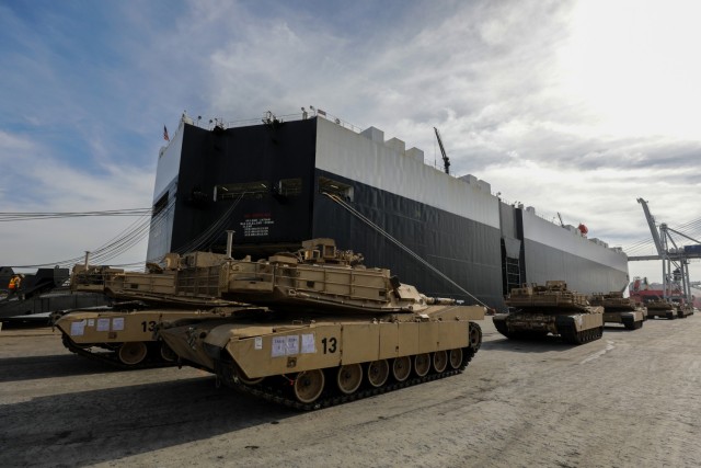 Soldiers assigned to 2nd Brigade Combat Team waits to move M1A1 Abrams tanks aboard a military transport vessel in support of DEFENDER-Europe 20 at the Port of Savannah, Ga. February 12, 2020.  
...