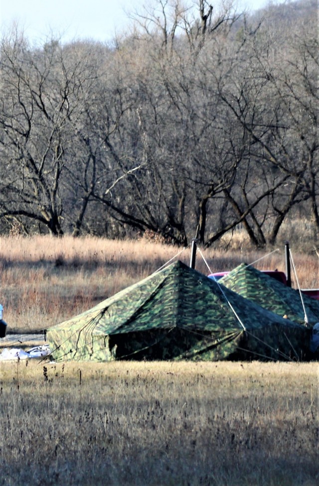 Arctic tents are shown set up Dec. 10, 2020, at a North Post training area at Fort McCoy, Wis. Cold-Weather Operations Course (CWOC) Class 21-01 students set up the tents for their first night of staying in the field. CWOC students are trained on...