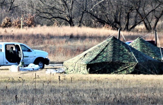 Arctic tents are shown set up Dec. 10, 2020, at a North Post training area at Fort McCoy, Wis. Cold-Weather Operations Course (CWOC) Class 21-01 students set up the tents for their first night of staying in the field. CWOC students are trained on...