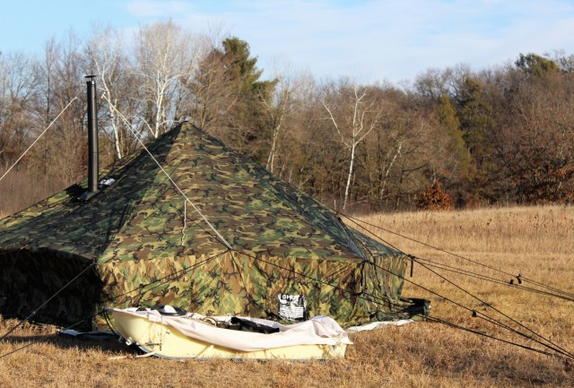 An Arctic tent is shown set up Dec. 10, 2020, at a North Post training area at Fort McCoy, Wis. Cold-Weather Operations Course (CWOC) Class 21-01 students set up the tents for their first night of staying in the field. CWOC students are trained on...