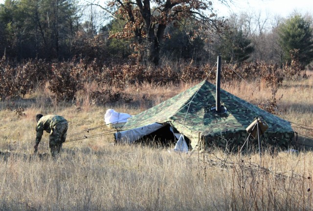 An Arctic tent is shown set up Dec. 10, 2020, at a North Post training area at Fort McCoy, Wis. Cold-Weather Operations Course (CWOC) Class 21-01 students set up the tents for their first night of staying in the field. CWOC students are trained on...