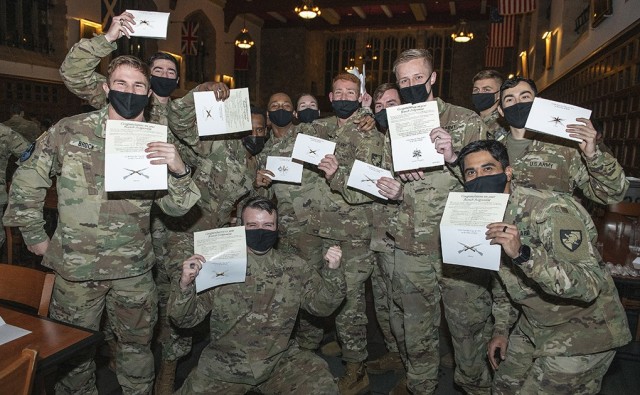 The cadets in the U.S. Military Academy’s Class of 2021 burst into cheers and celebrate after they unsealed their envelopes during West Point’s annual Branch Night Dec. 2 at Washington Hall. During the ceremony, 992 members of the class...