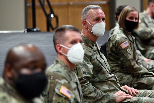 Maj. Gen. Dennis LeMaster (center) and others members of the panel listen as Soldiers asks a question on the Army Combat Fitness Test.