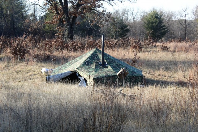 An Arctic tent is shown set up Dec. 10, 2020, at a North Post training area at Fort McCoy, Wis. Cold-Weather Operations Course (CWOC) Class 21-01 students set up the tents for their first night of staying in the field. CWOC students are trained on...