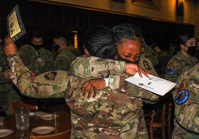 The cadets in the U.S. Military Academy’s Class of 2021 burst into cheers and celebrate after they unsealed their envelopes during West Point’s annual Branch Night Dec. 2 at Washington Hall. During the ceremony, 992 members of the class...