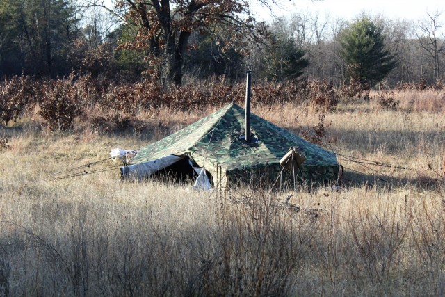 An Arctic tent is shown set up Dec. 10, 2020, at a North Post training area at Fort McCoy, Wis. Cold-Weather Operations Course (CWOC) Class 21-01 students set up the tents for their first night of staying in the field. CWOC students are trained on...