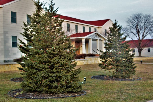 Holiday lights are shown on trees in front of garrison headquarters on Dec. 10, 2020, at Fort McCoy, Wis. The area is decorated as part of the installation observance of the holiday season. McCoy's Community Center is operated by the Fort McCoy...