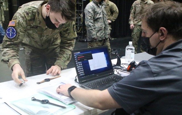 West Point cadet Michael Larsen registers to receive a Samsung Galaxy Watch3. The watches will be used to help identify cadets who have contracted COVID-19 through the use of enhanced contact tracing capabilities at the U.S. Military Academy. The...