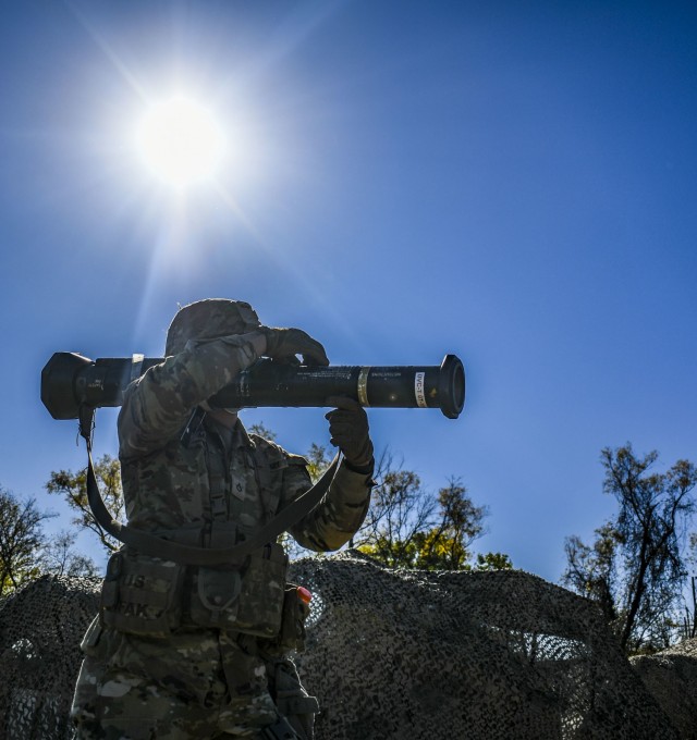 PFC Jamie Martinez, with Bravo Company, 1st Battalion, 5th Cavalry Regiment , 2nd Armored Brigade Combat Team, acquires a target with an AT4 while participating in the Expert Infantryman Badge/Expert Soldier Badge Qualification Course, November...