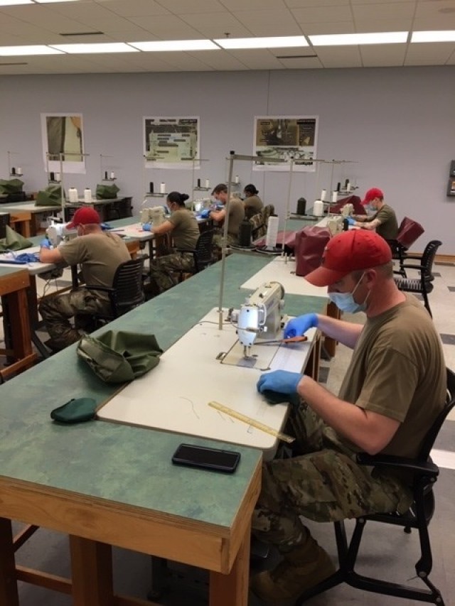 Cadre and student Soldiers at the Tank-automotive and Armaments Command’s Fort Lee Forward Maintenance Expansion Quartermaster Army Parachute Rigger School sew surgical masks to support local personal protective gear needs during the early...