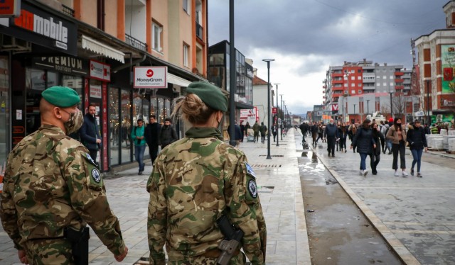 2nd Lt. Csilla Egyed and Cpl. Bertalan Pinces, Hungarian Defense Forces soldiers serving on a liaison monitoring team for NATO’s Kosovo Force, conduct a routine patrol in Podujevë/Podujevo, Kosovo, on Dec. 9, 2020. Egyed is the officer in...