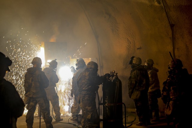 Soldiers with the 2nd Armored Brigade Combat Team, 1st Infantry Division breach obstacles using thermal breaching techniques at Camp Stanley, Republic of Korea. The "Dagger" Brigade was the eighth rotational brigade deployed in support of the 2nd Infantry Division and our Korean allies. (U.S. Army photo by Staff Sgt. Simon McTizic)