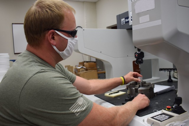 Crane Army Ammunition Activity is dedicated to ensuring every last part of their munitions are perfect before they are sent to the warfighter. This Crane Army employee is monitoring a machine that measures pieces of munition casing to make sure...