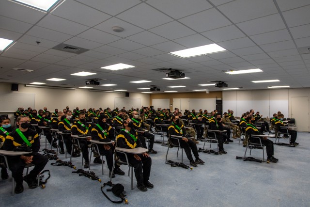 Trainees with 2nd Batallion, 60th Infantry Regiment participate in mindfulness practice as part of the Mindfulness and Yoga pilot program, Dec. 9.