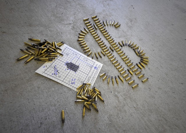 Combat arms instructors at the 354th Security Forces Squadron us an engagement skills trainer to save money prior to Airmen firing live ammunition. An engagement skills trainer is a computer based training module which uses air compression and a...