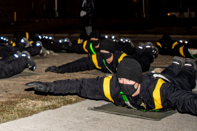 Trainees with 2nd Batallion, 60th Infantry Regiment do yoga as part of the Mindfulness and Yoga pilot program, Dec. 8.