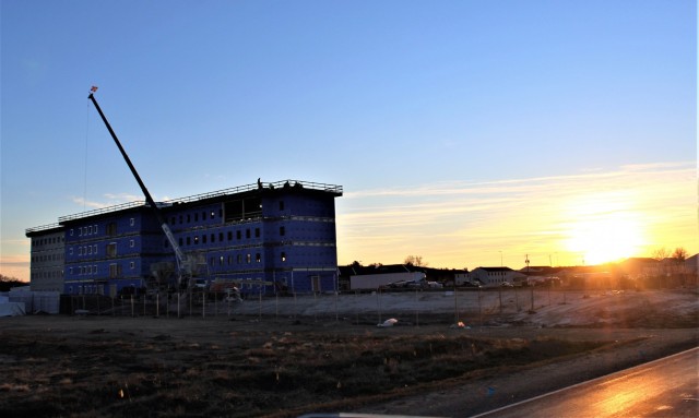 An area of the 1600 block of the cantonment area of the installation is shown Dec. 3, 2020, at sunset as a new multi-million dollar transient troop training barracks is being built at Fort McCoy, Wis. Contractor L.S. Black Constructors was awarded...