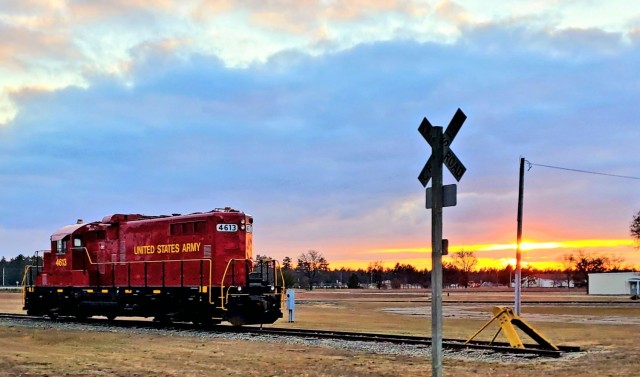 A U.S. Army locomotive used as part of rail operations is shown Dec. 16, 2020, at sunset at Fort McCoy, Wis. For the many decades of Fort McCoy’s existence, the capability to transport cargo and equipment to and from the installation by rail has...