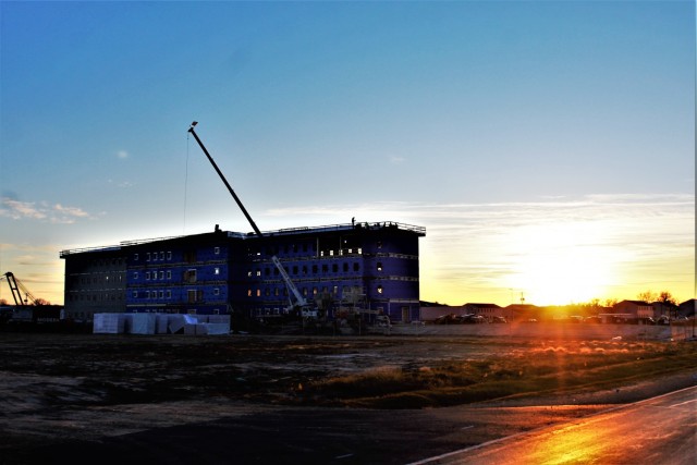 An area of the 1600 block of the cantonment area of the installation is shown Dec. 3, 2020, at sunset as a new multi-million dollar transient troop training barracks is being built at Fort McCoy, Wis. Contractor L.S. Black Constructors was awarded...
