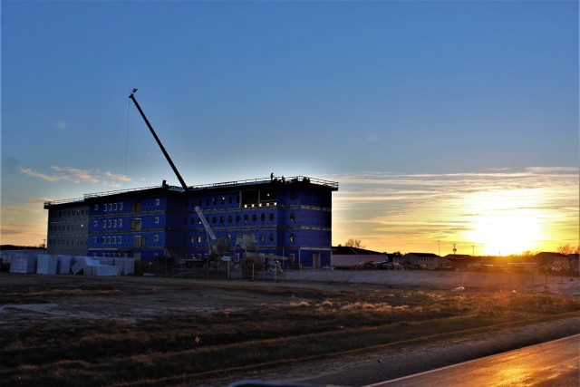 An area of the 1600 block of the cantonment area of the installation is shown Dec. 3, 2020, at sunset as a new multi-million dollar transient troop training barracks is being built at Fort McCoy, Wis. Contractor L.S. Black Constructors was awarded...