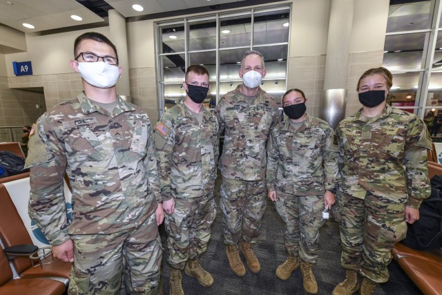 Maj. Gen. Dennis LeMaster, U.S. Army Medical Center of Excellence Commanding General pictured with Soldiers departing training MEDCoE for Holiday Block Leave on December 19, 2020. (Pictured from left to right:  Pvt. Colton Pohl, Pvt. Logan Stephens, Maj. Gen. Dennis LeMaster, Pvt. Elena Butler and Pvt. Abby Ryder.)