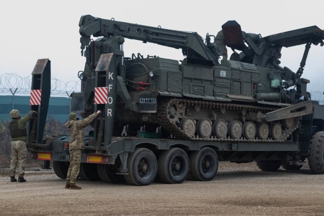 Members of the Ukrainian Freedom of Maneuver Detachment unload a BAT-2 armored tracklayer during obstacle and barrier removal training at Camp Marechal de Lattre De Tassigny in Kosovo on Dec. 16, 2020. The FOMD cooperated with U.S. forces to complete the training exercise, and has trained many multinational units in support of NATO’s Kosovo Force. KFOR is dedicated to maintaining peace and stability in the region through regular training and joint cooperation. (U.S. Army National Guard photo by Sgt. Zachary M. Zippe)