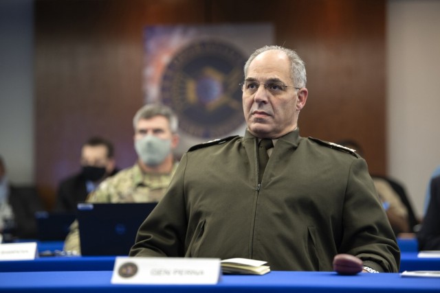 Army Gen. Gustave F. Perna, chief operating officer of Operation Warp Speed, monitors a simulation exercise in Washington, D.C. Nov. 13, 2020. Operation Warp Speed is an effort by several U.S. government components and public and private...