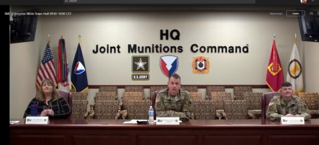 Col. Gavin J. Gardner, center, Commander of Joint Munitions Command, addresses the JMC workforce virtually, December 16, 2020, during his first town hall. Joining him were JoEtta Fisher, Executive Director of Ammunition and Deputy to the...