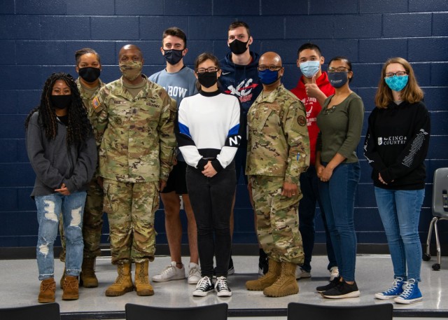 Command Sgt. Maj. Sean Rice, from U.S. Army Security Assistance Command at Redstone Arsenal, poses with the instructors and cadet leadership of the JROTC class at Bob Jones High School, 12 Nov., in Huntsville, AL. (US Army photo by Richard...