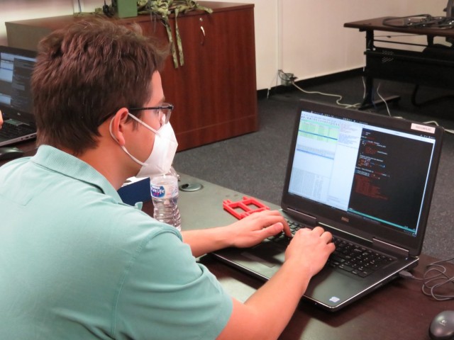 Fort Hood, Texas -Thomas McCain, civilian contractor performing a cyber-penetration test of Hand-Held, Manpack, and Small Form Fit (HMS) system at the Central Technical Support Facility.