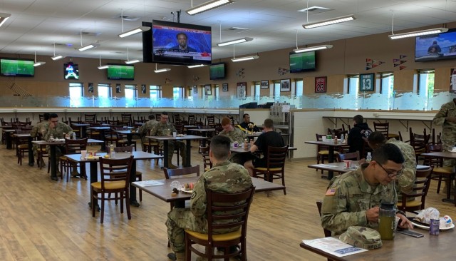 Soldiers enjoy their meal in the updated dining facility at Fort Wainwright. New furniture was brought in, along with the instillation of 30 televisions and the addition of Wi-Fi.